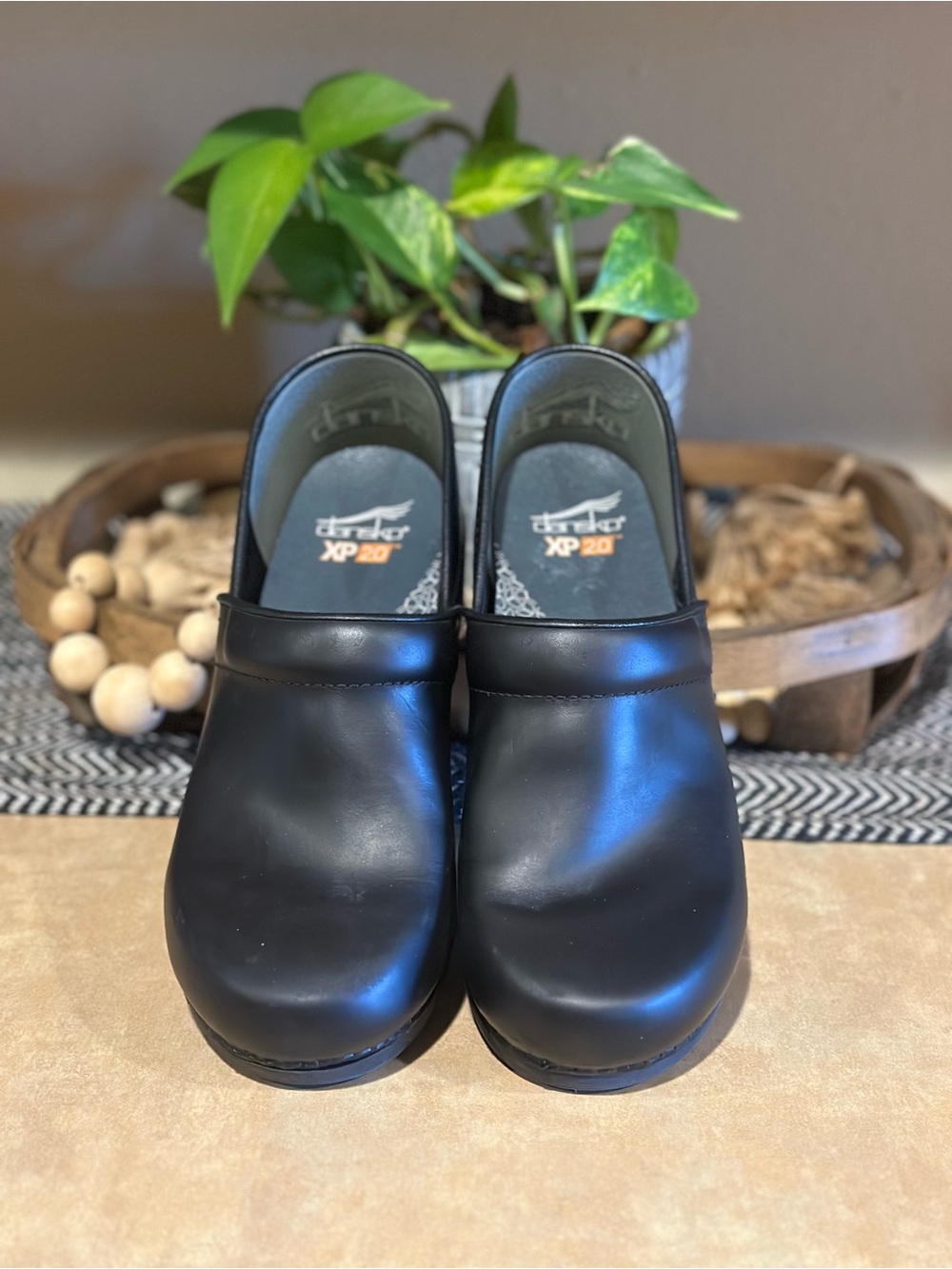 Dansko Black Leather Slip-On Clogs